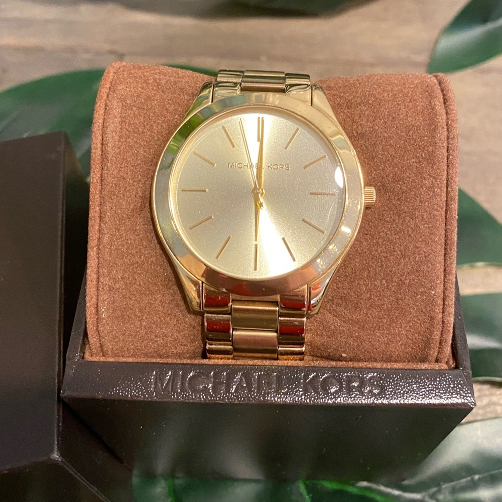 Gold Michael Korda women’s watch